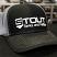 Stout Tanks and Kettles swag trucker hat - light grey mesh - profile view